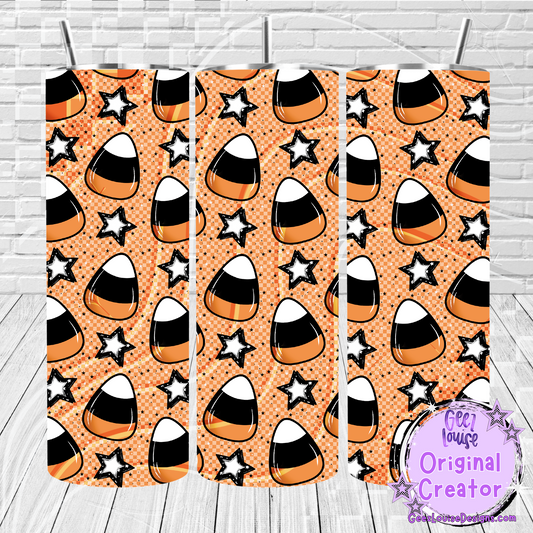 Halloween-themed pattern with candy corn and stars on a peach background.
